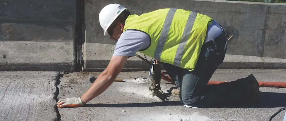 commercial engineer fixing concrete